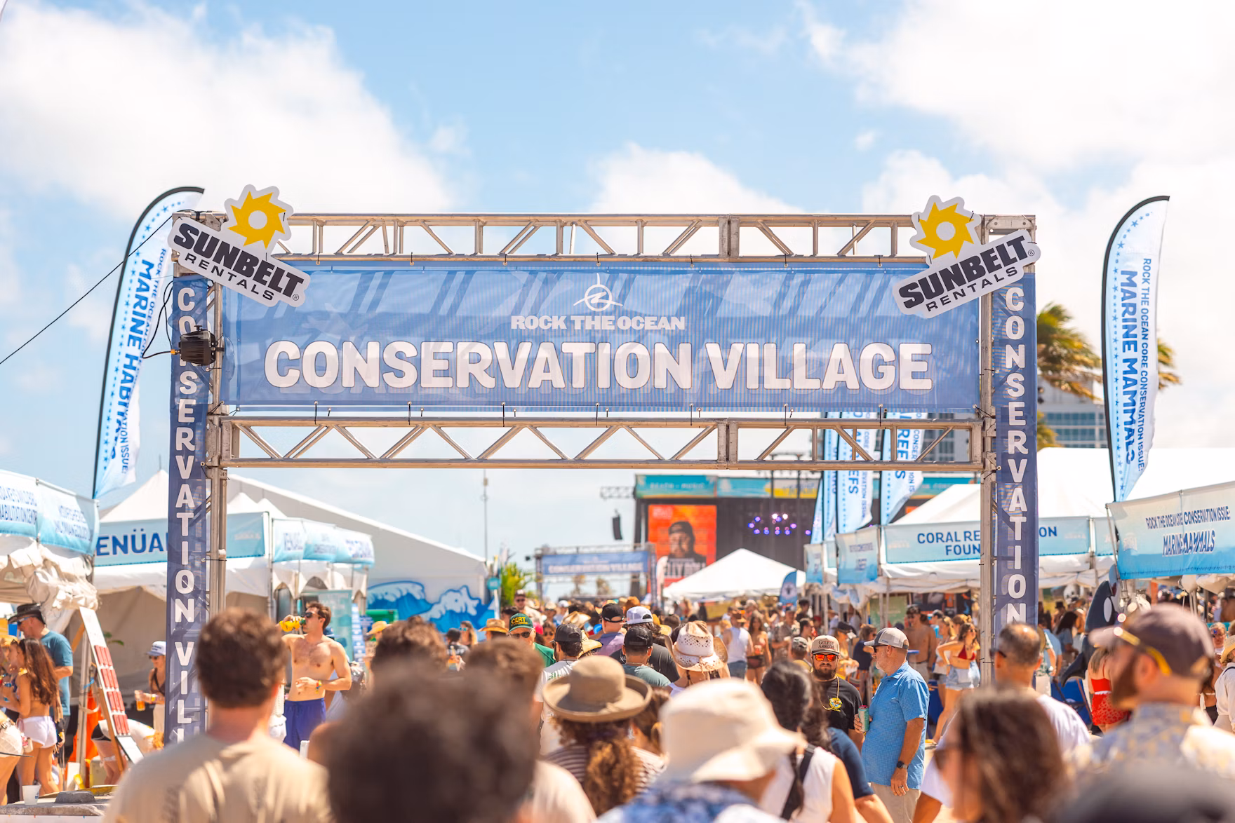 Conservation Village Banner with Sunbelt Sponsorship signage